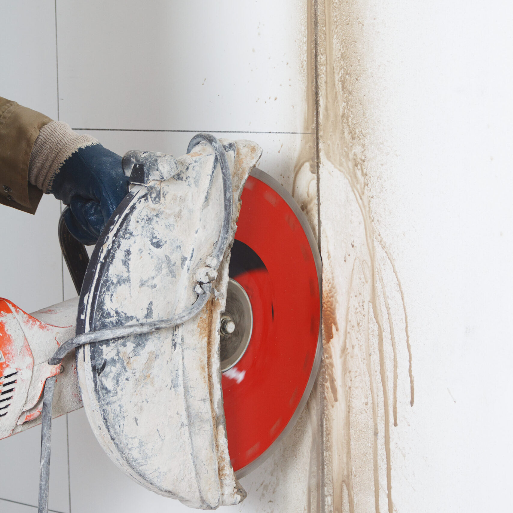 Creation of a new doorway. Cutting concrete wall angle grinder